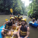 Thrilling river rafting experience navigating through rapids and stunning landscapes
