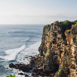 Stunning views of Uluwatu, showcasing its famous cliffs, beach, and the iconic Uluwatu Temple