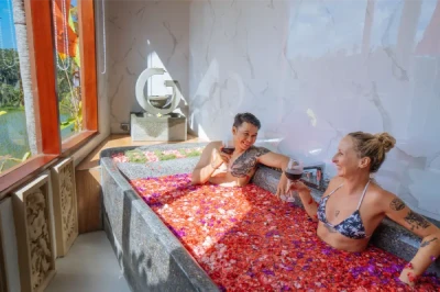 couple take a flower bathtub treatment