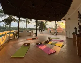 a semi outdoor yoga space